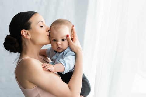 mom soothing fussy baby