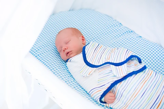 Baby swaddled great idea for how to get your baby to sleep without being held