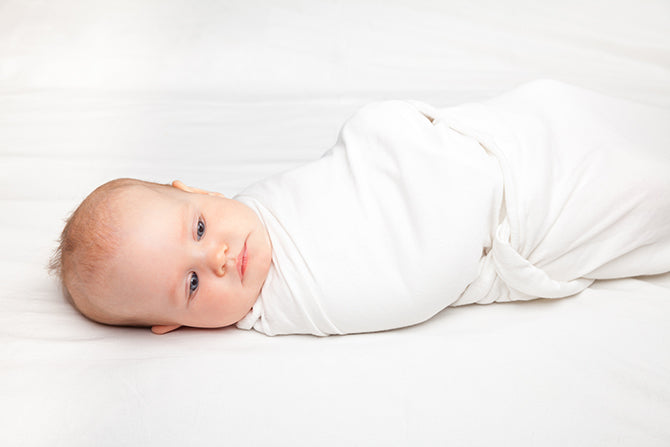 Baby swaddled great idea for how to get your baby to sleep without being held