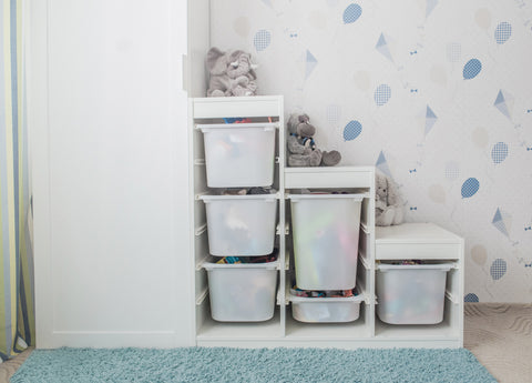 Storage bins to help organize baby clothes