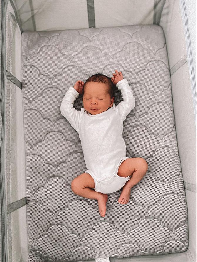 baby sleeping in smart bassinet