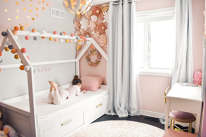 Young girl in her bed with her toddler pillow