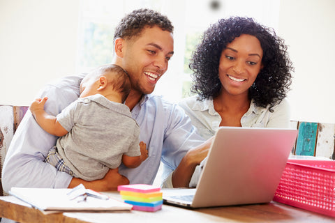 New parents working from home with a baby