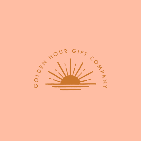 Peach background with golden hour sun logo and arched text