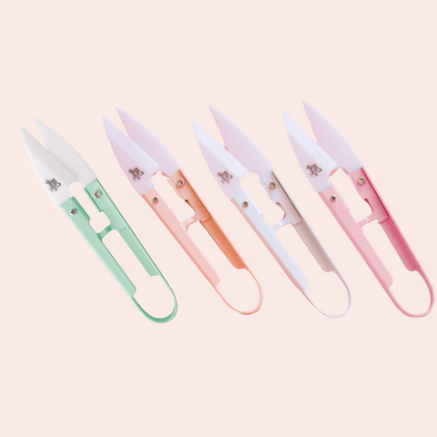 4 different colors of plant snips