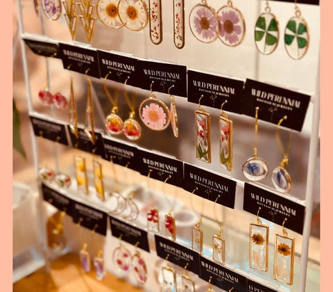 image of Wild Perennial earrings on display in our Burlington store