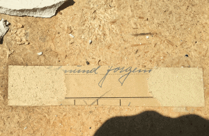 Edmund Jorgensen signature revealed when the tile surface was removed from the coffee table.