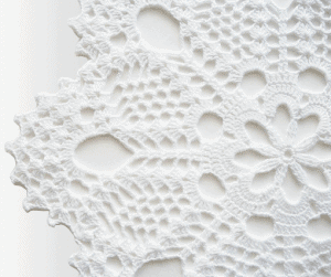 Crocheted doilie. source:  handcraftedorVinage Etsy shop https://www.etsy.com/listing/180383805/large-crochet-doily-white-cotton-lace?ref=market