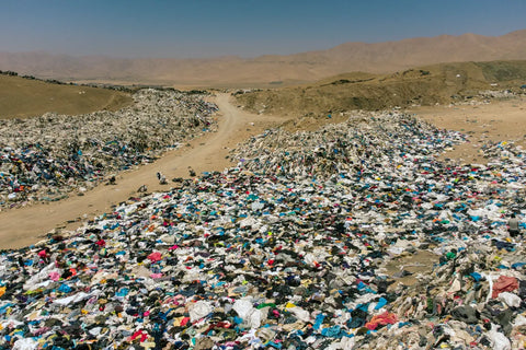 Used clothes discarded in the Atacama Desert, in Alto Hospicio, Iquique, Chile. [Martin Bernetti/AFP]