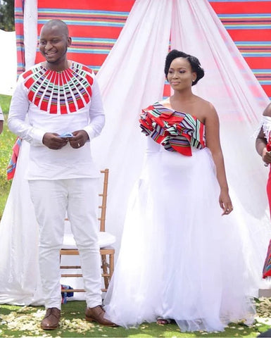 Couples portant une robe de mariée africaine Venda