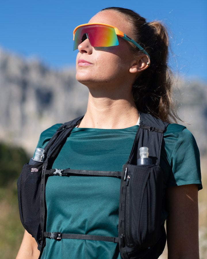Occhiale da donna per trail running arancio fluo lente specchiata rossa modello ROUBAIX