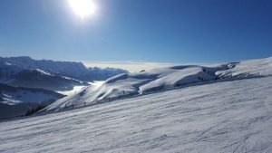 foto pista sci con meteo soleggiato dove utilizzare maschera da sci con lente fumo