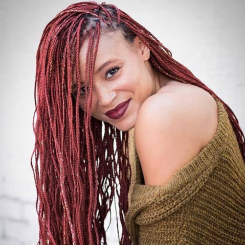 woman with red micro braids