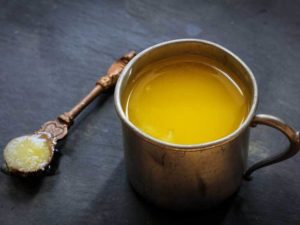 ghee in copper cup