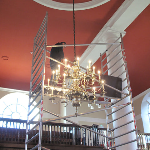 Restoration of a Church chandelier that was taken down dismantled, polished, lacquered, rewired and then rehung