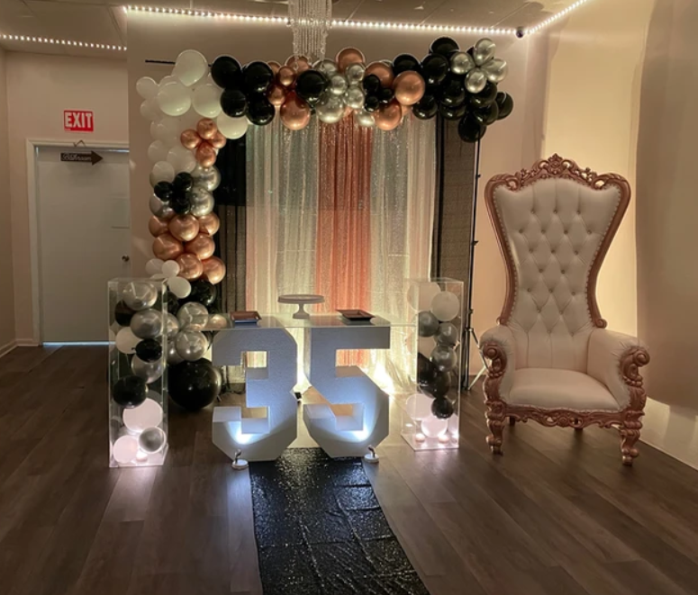 A beautiful setup of a Balloon Garland for a 35th Birthday