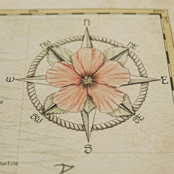 A picture of Florida's compass.  Exotic and nautical, the unique compass is the seal of Royale Maps.  Nature is your compass.