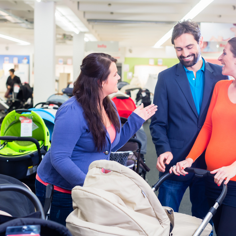 Man-and-woman-pram-shopping