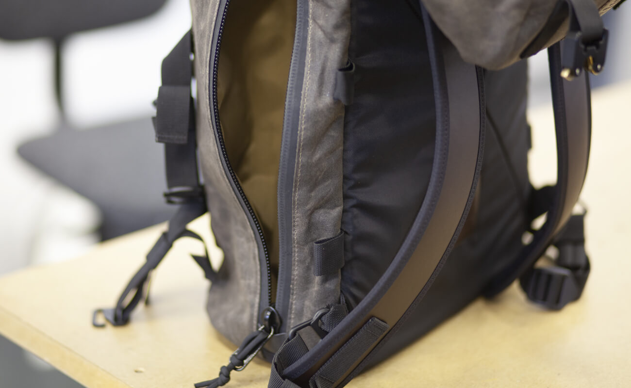 Side view of the Amhara 15 SA waxed canvas backpack