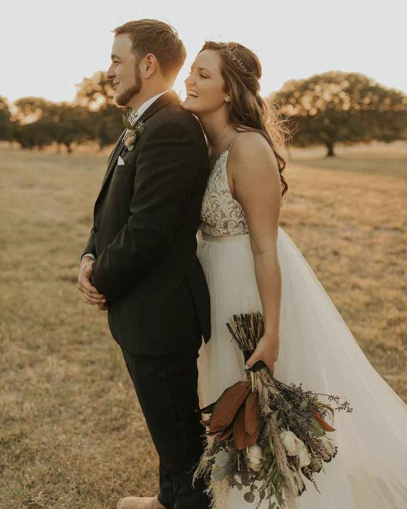 Texas bride holding sustainable dried flower bouquet