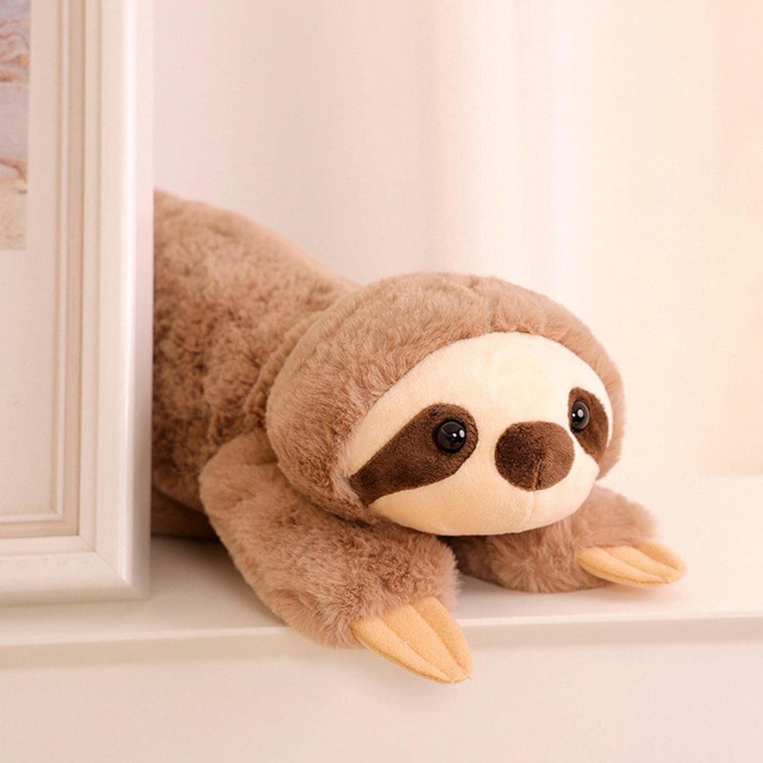 Relaxing with CozyBuddy™ Weighted Sloth Stuffed Animal to reduce stress and improve sleep