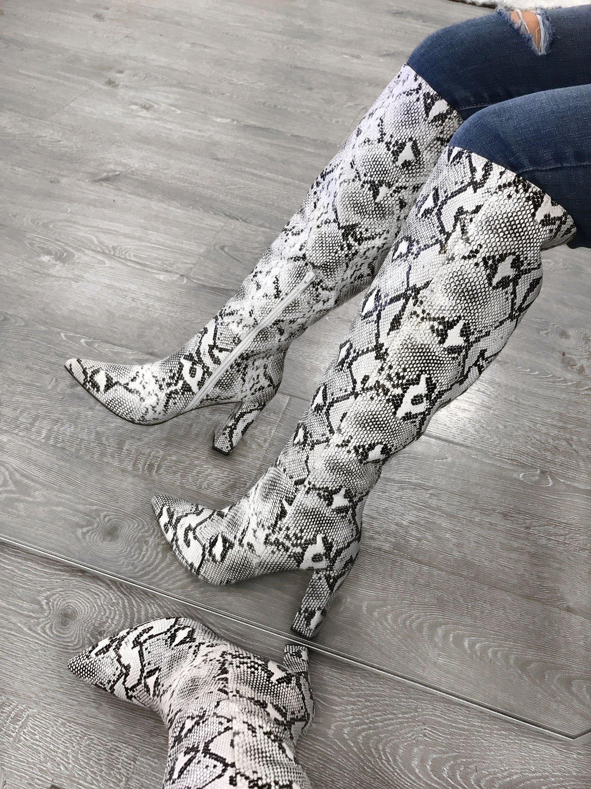 thigh high snake print boots