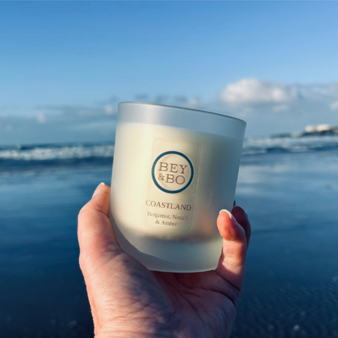 Coastland candle on water