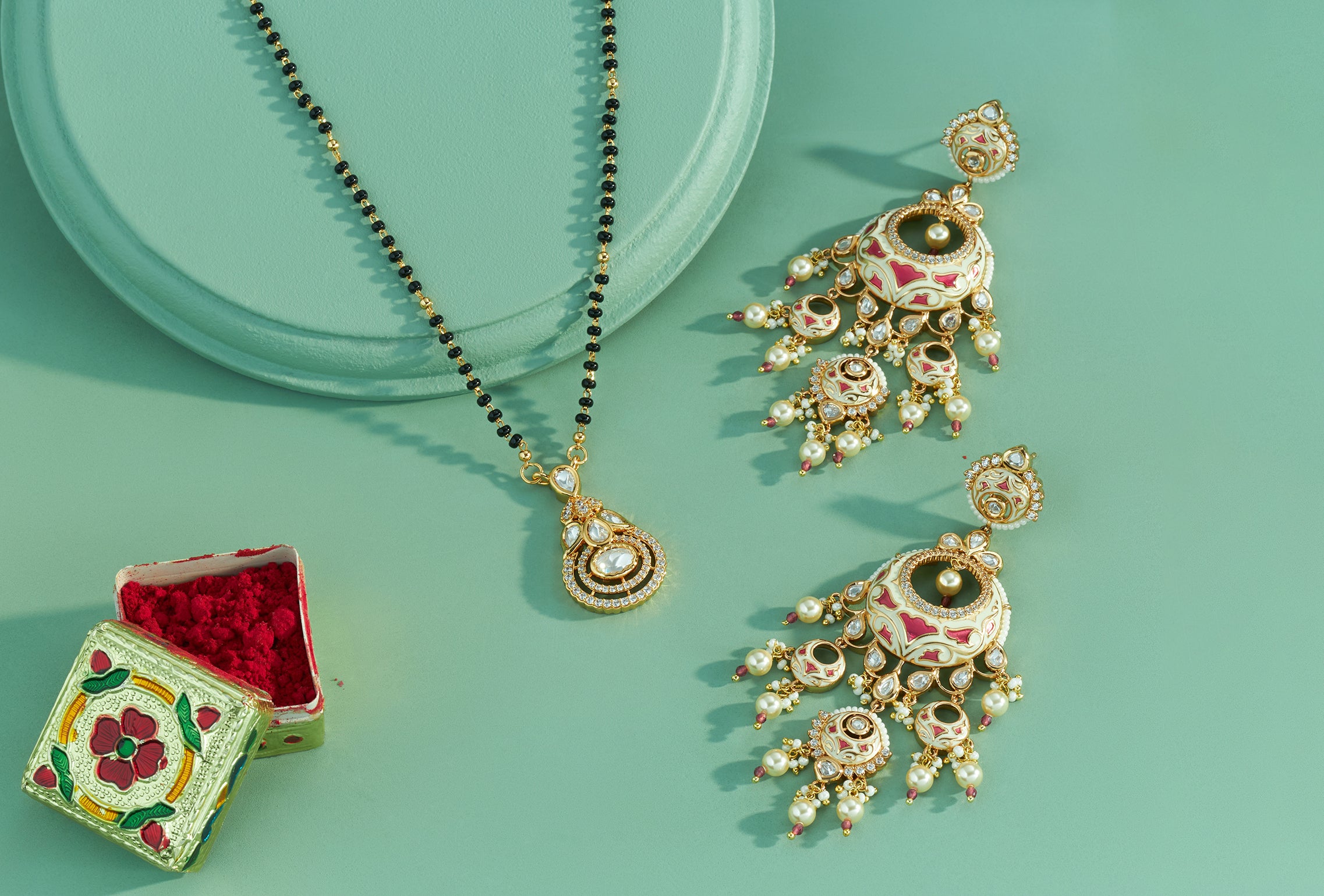 Earrings and mangalsutras for Karwa Chauth