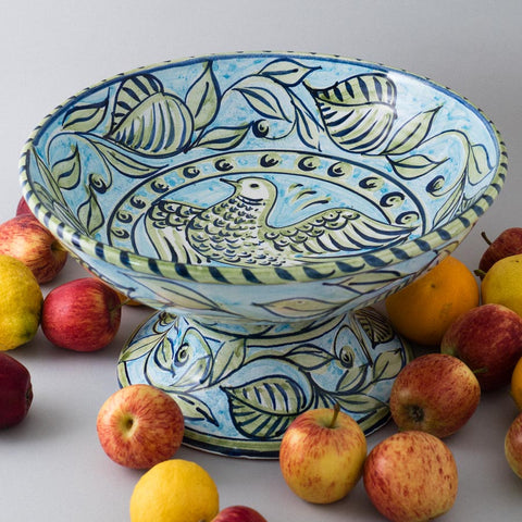A fruit bowl with bird design