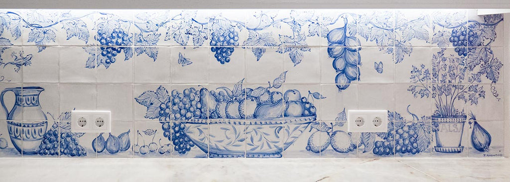 A kitchen backsplash with Porches Pottery tiles