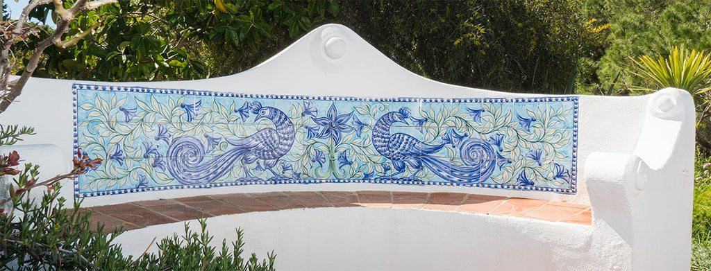 A bench with a Porches Pottery back