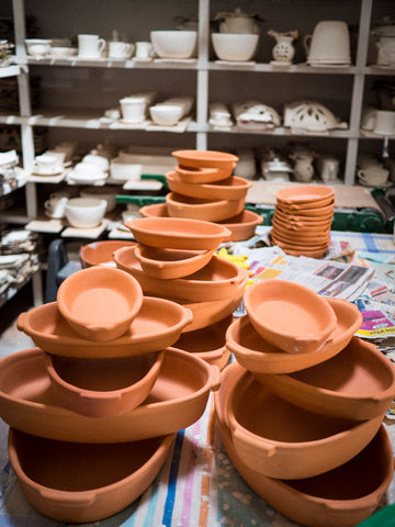 Dishes waiting to be glazed