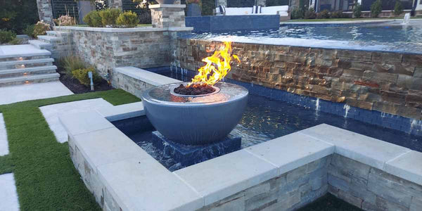 Savannah 360° Fire & Water Bowl - GFRC Concrete | 38" Placed in a Pool with Lava Rock V2