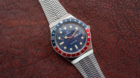 timex q gmt watch with stainless steel bracket