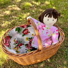 A Jemima Doll in a basket.