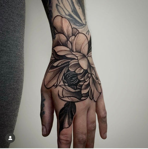 Saffron hand tattoo