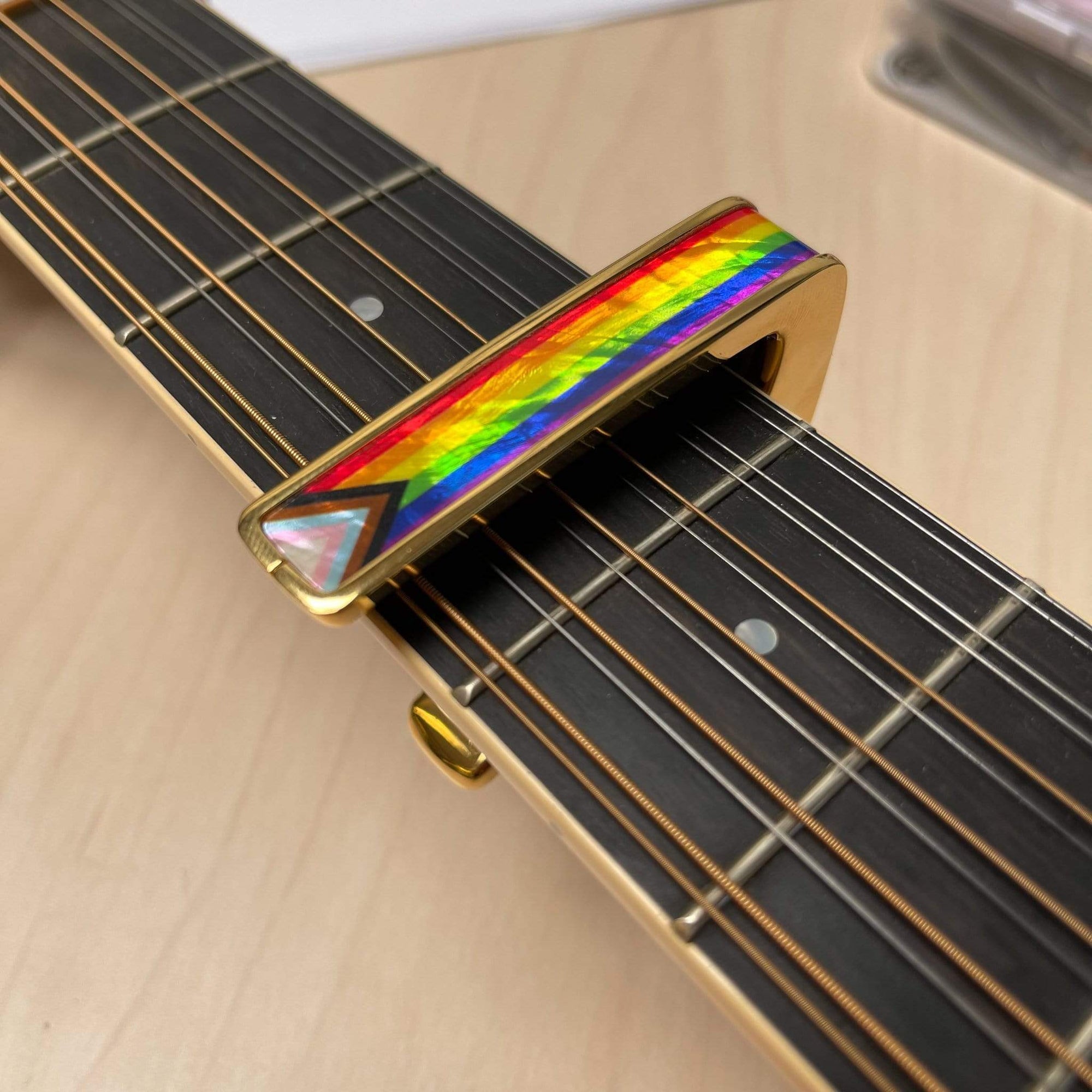 guitars with gay flag colors