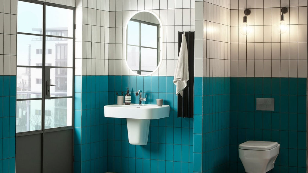 Blue bathroom scene styled with gordon heated towel warmer