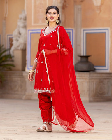 Chic embroidered salwar suit ensemble in vibrant red