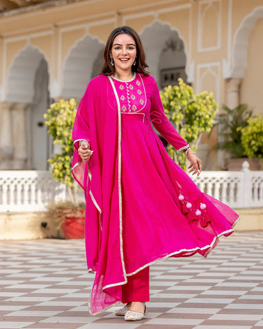 Elegant pink Anarkali suit set featuring intricate embroidery, perfect for special occasions
