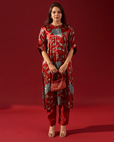 Elegant red kaftan kurta set adorned with floral vine patterns for a chic look