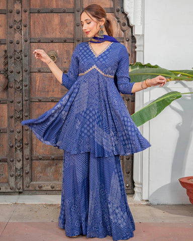 Graceful blue bandhej and sequin sharara set adorned with intricate details.