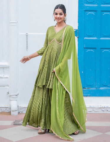 Modern green sharara set with traditional Bandhej designs and contemporary sequin accents