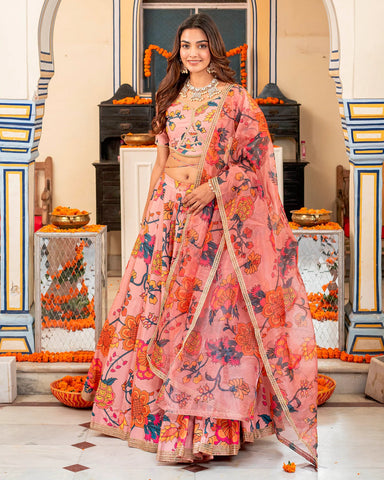 Modern lehenga set in pastel pink adorned with beautiful floral patterns for a trendy appearance
