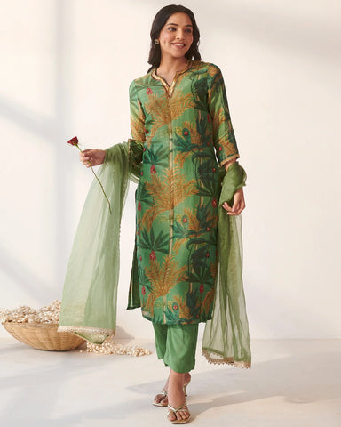Modern suit ensemble adorned with green foliage prints