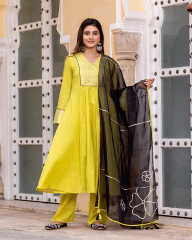 Modern suit set in neon green with traditional Gota Patti designs