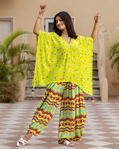 Neon yellow Bandhej kaftan kurta set with intricate traditional patterns