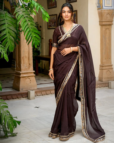Stylish brown Tamba work saree with beautiful embellishments for an exquisite ensemble