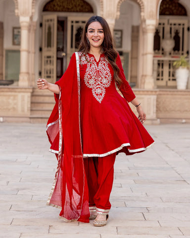 Stylish red Kalidaar suit set with beautiful Gota embellishments.