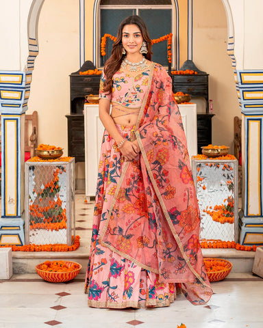 Trendy pastel pink lehenga set showcasing exquisite floral embellishments